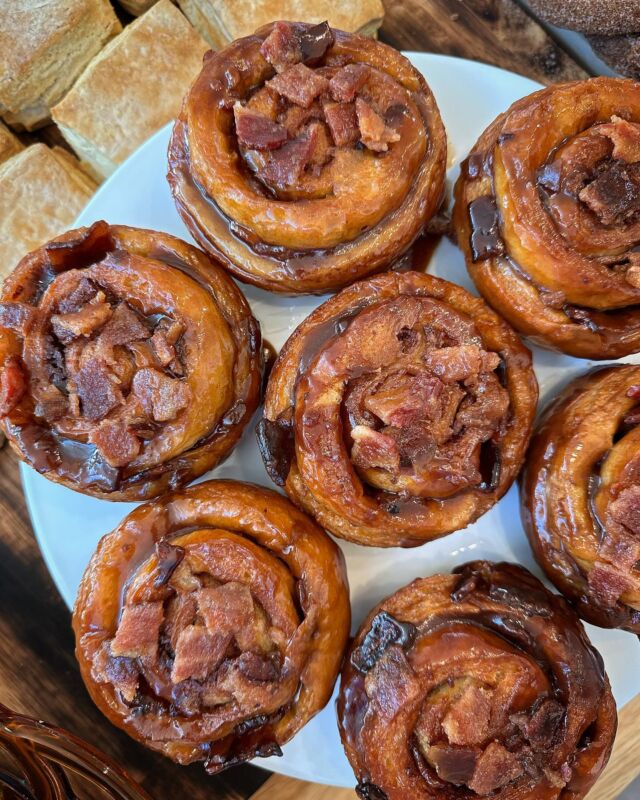 BACON STICKY BUNS! We felt inspired by @hogsforthecause this weekend and decided to make these sticky buns. We took our cinnamon rolls and added bacon to the filling, baked them with a bacon fat caramel glaze, and topped them with candied bacon. Available at the shop this weekend only!
.
#stickybun #bacon #candiedbacon #bakery #nolafood #wherenolaeats